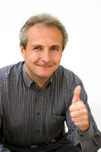 Job seeker gives his thumbs up for free interview answers